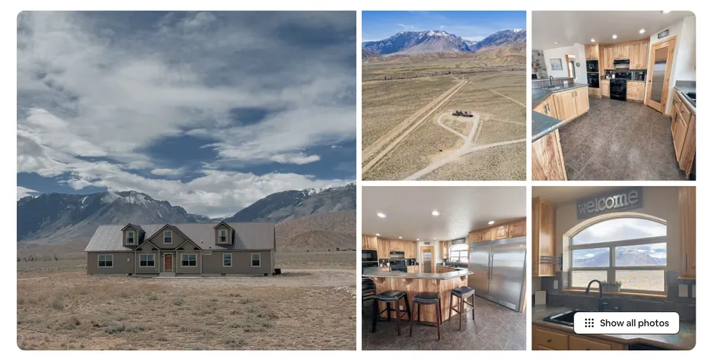 A holiday rental listing for a grey ranch house alone on the sage flats below the mountains, with an aerial view, the kitchen and a window over the plain