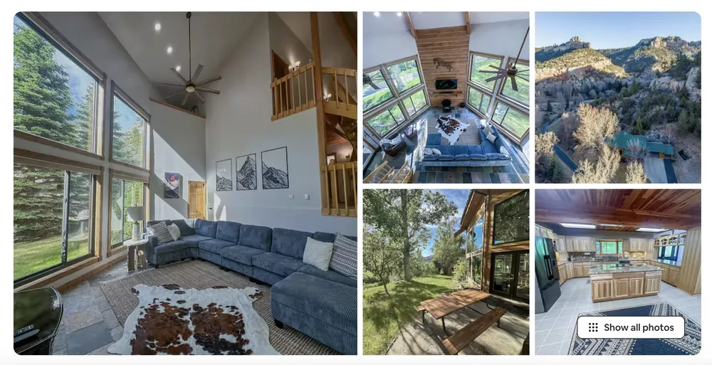 A holiday rental listing for a house with a double height wall of windows and a cowhide rug, showing the sitting room, an aerial view and the kitchen
